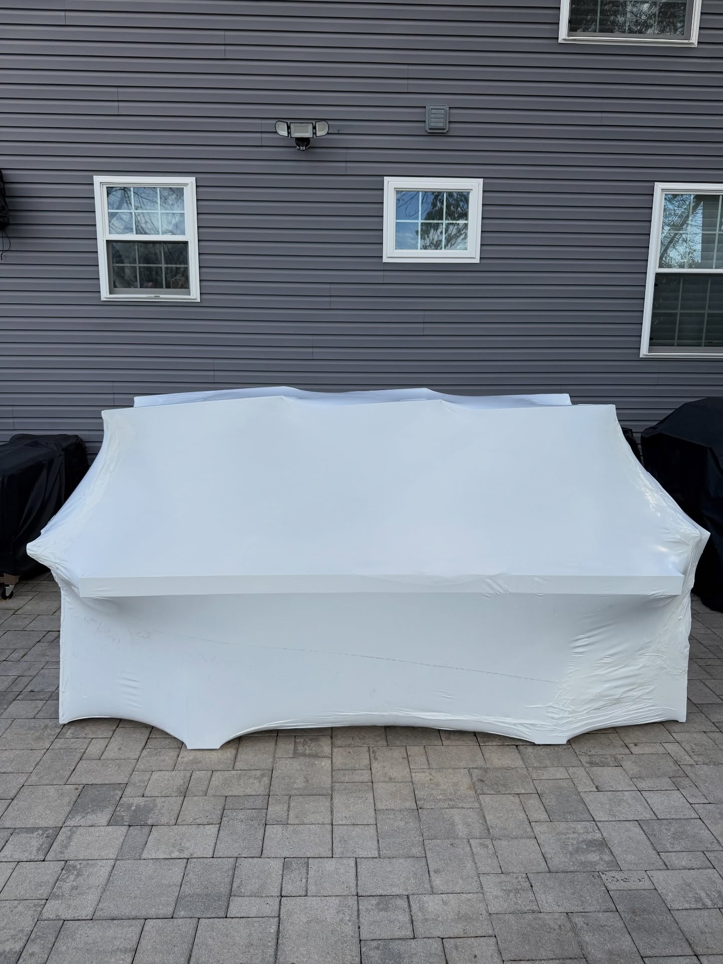 Shrink-wrapped outdoor sofa